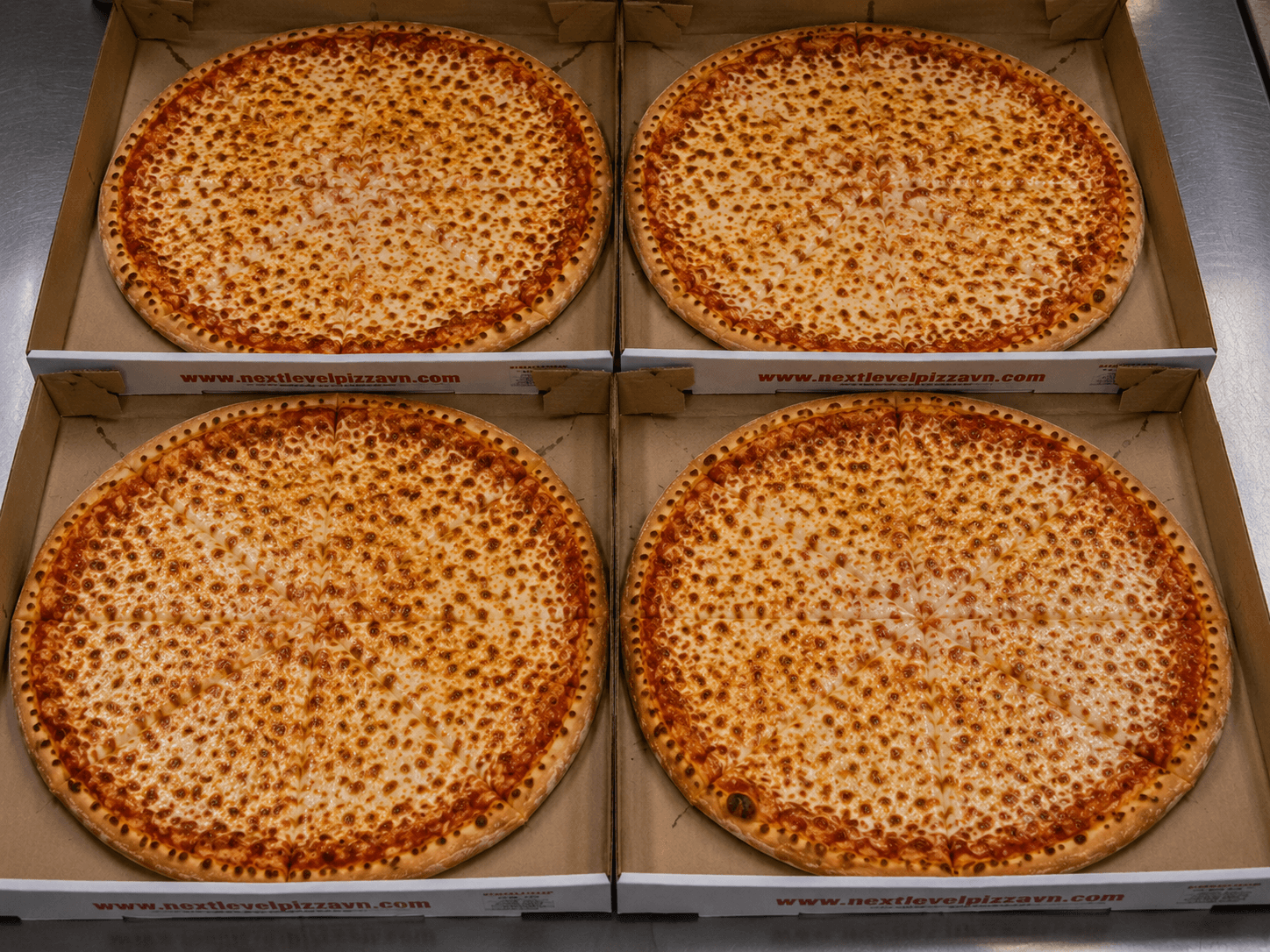 4 Large Cheese Pizzas